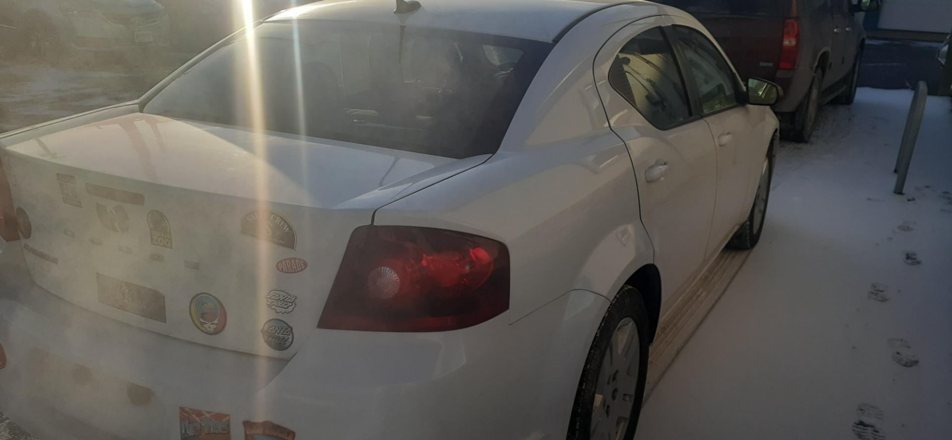 2013 Dodge Avenger SE (1C3CDZAG1DN) with an 3.6L V6 DOHC 24V FFV engine, 6-Speed Automatic transmission, located at 2015 Cambell Street, Rapid City, SD, 57701, (605) 342-8326, 44.066433, -103.191772 - Photo#3